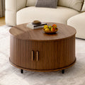 Modern 31.5″ Round Coffee Table with Hidden Storage - Fluted Wood Accent & 360° Curved Sliding Door